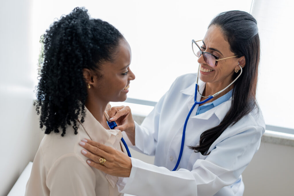 Medical doctor attending to a female patient