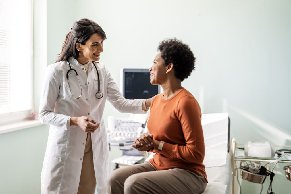 Happy female patient & urogynecologist 
