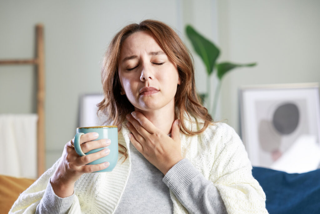 woman with sore throat 
